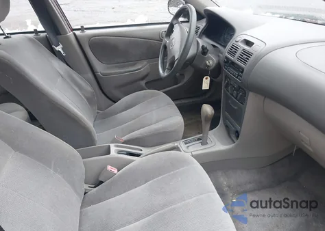 2002 Toyota Corolla Ce из США, поврежденный, VIN 2T1BR12E72C533307